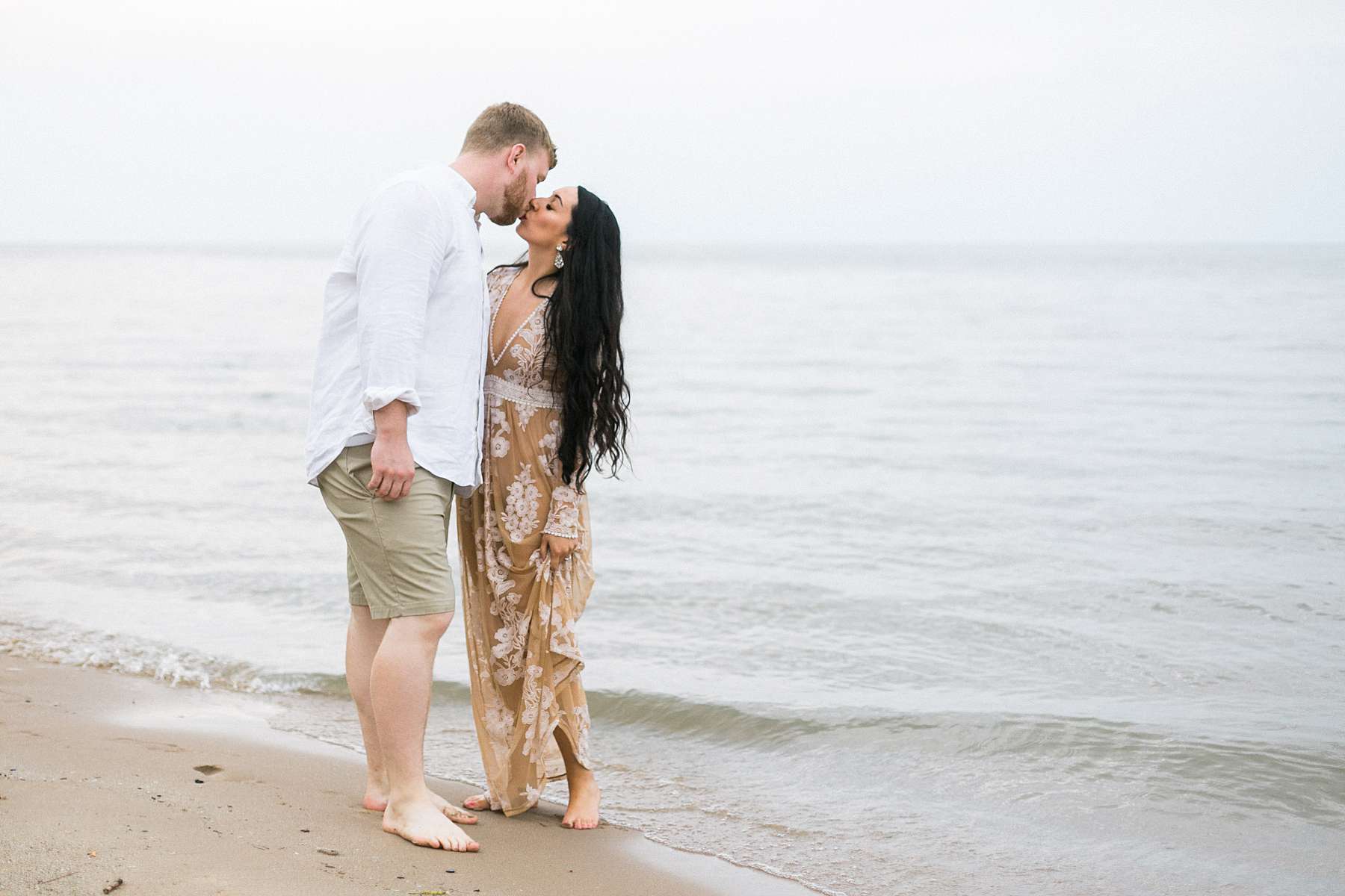 lakefront milwaukee bradford beach engagement in a long dress, photos by laurelyn savannah photography