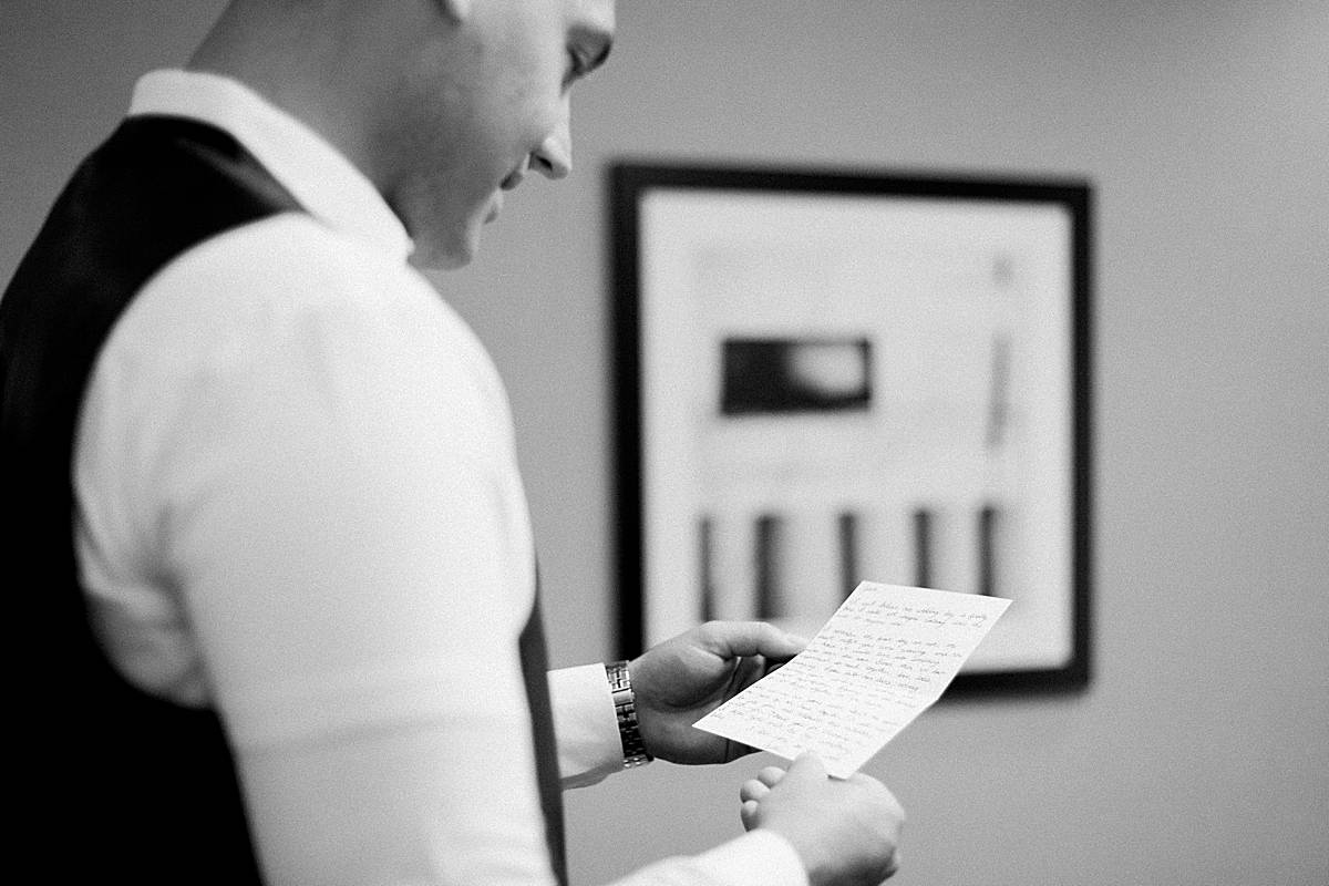 groom getting ready, romantic lavender wisconsin wedding at mercantile hall, photo by laurelyn savannah photography