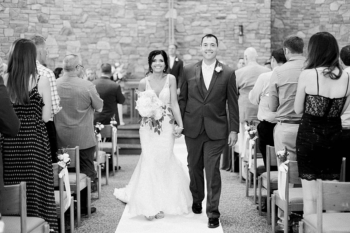 ceremony, romantic lavender wisconsin wedding at mercantile hall, photo by laurelyn savannah photography