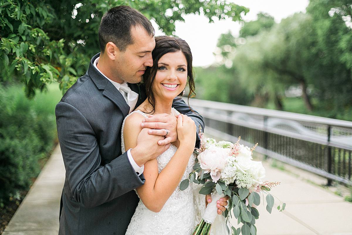 bride and groom portraits, romantic lavender wisconsin wedding at mercantile hall, photo by laurelyn savannah photography