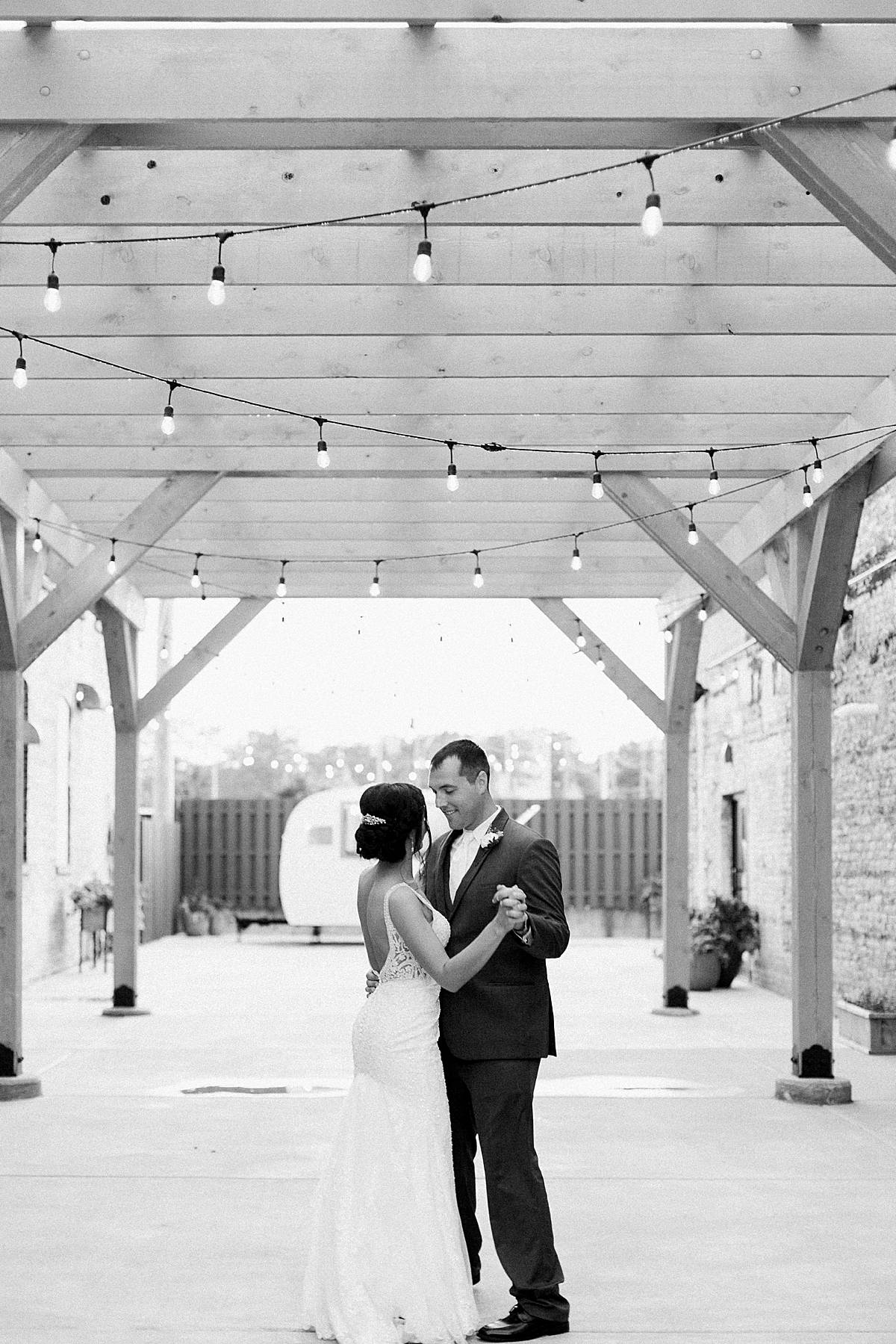 bride and groom portraits, romantic lavender wisconsin wedding at mercantile hall, photo by laurelyn savannah photography