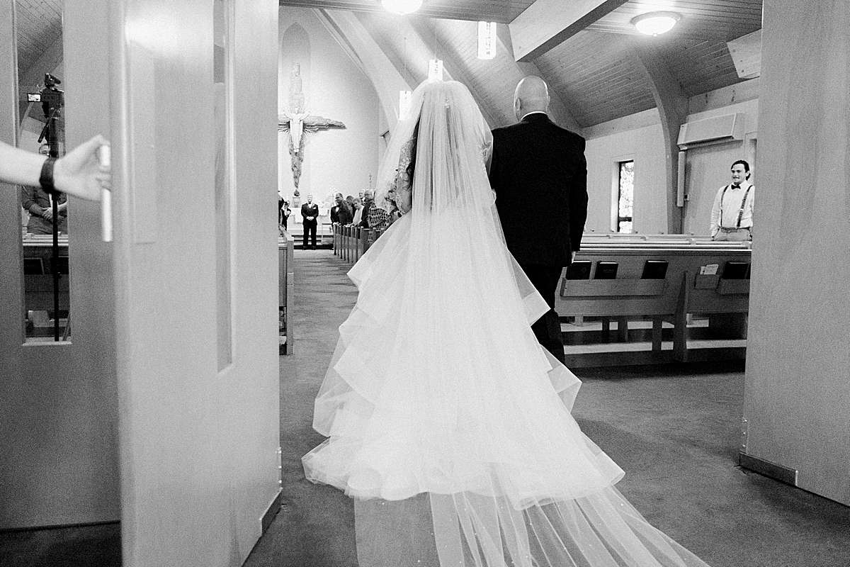 bride entering ceremony, romantic wisconsin wedding at sentry world stevens point, photo by laurelyn savannah photography