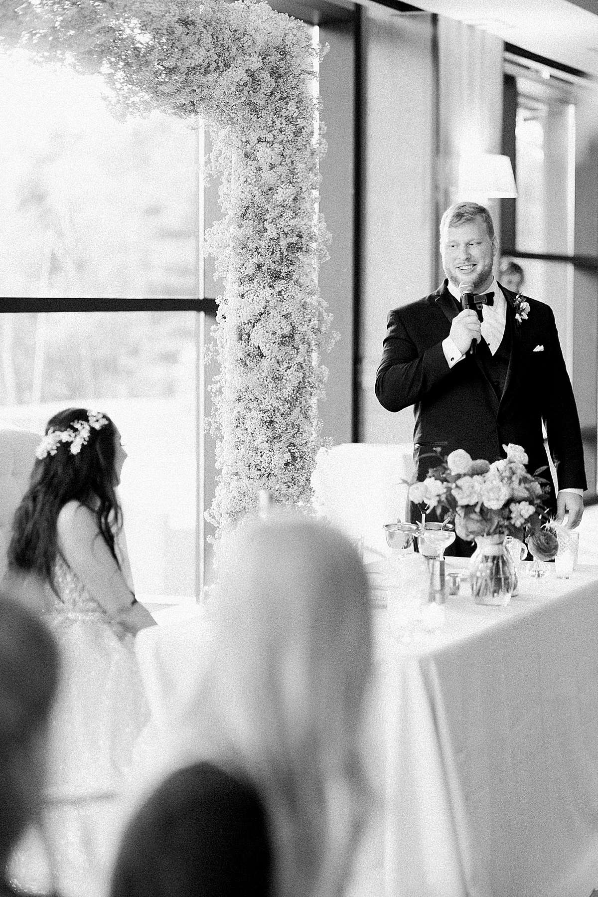 bride and groom toast, romantic wisconsin wedding at sentry world stevens point, photo by laurelyn savannah photography
