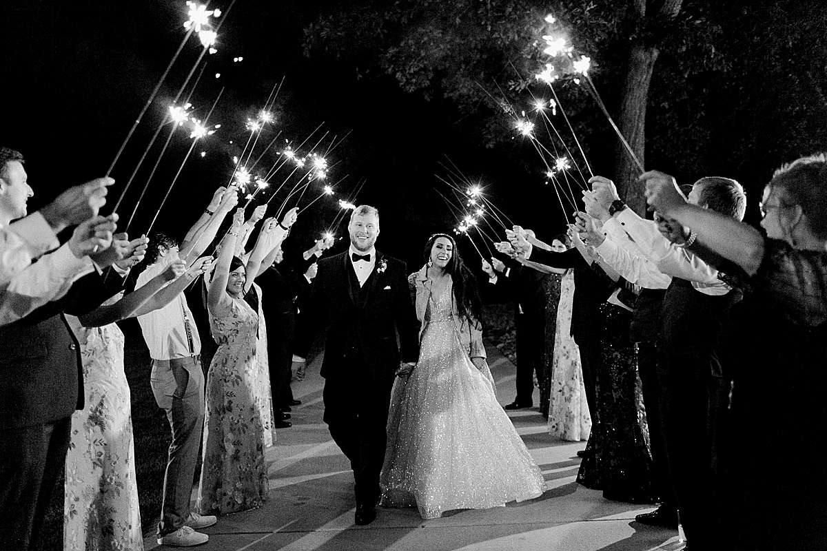 sparkler exit, romantic wisconsin wedding at sentry world stevens point, photo by laurelyn savannah photography
