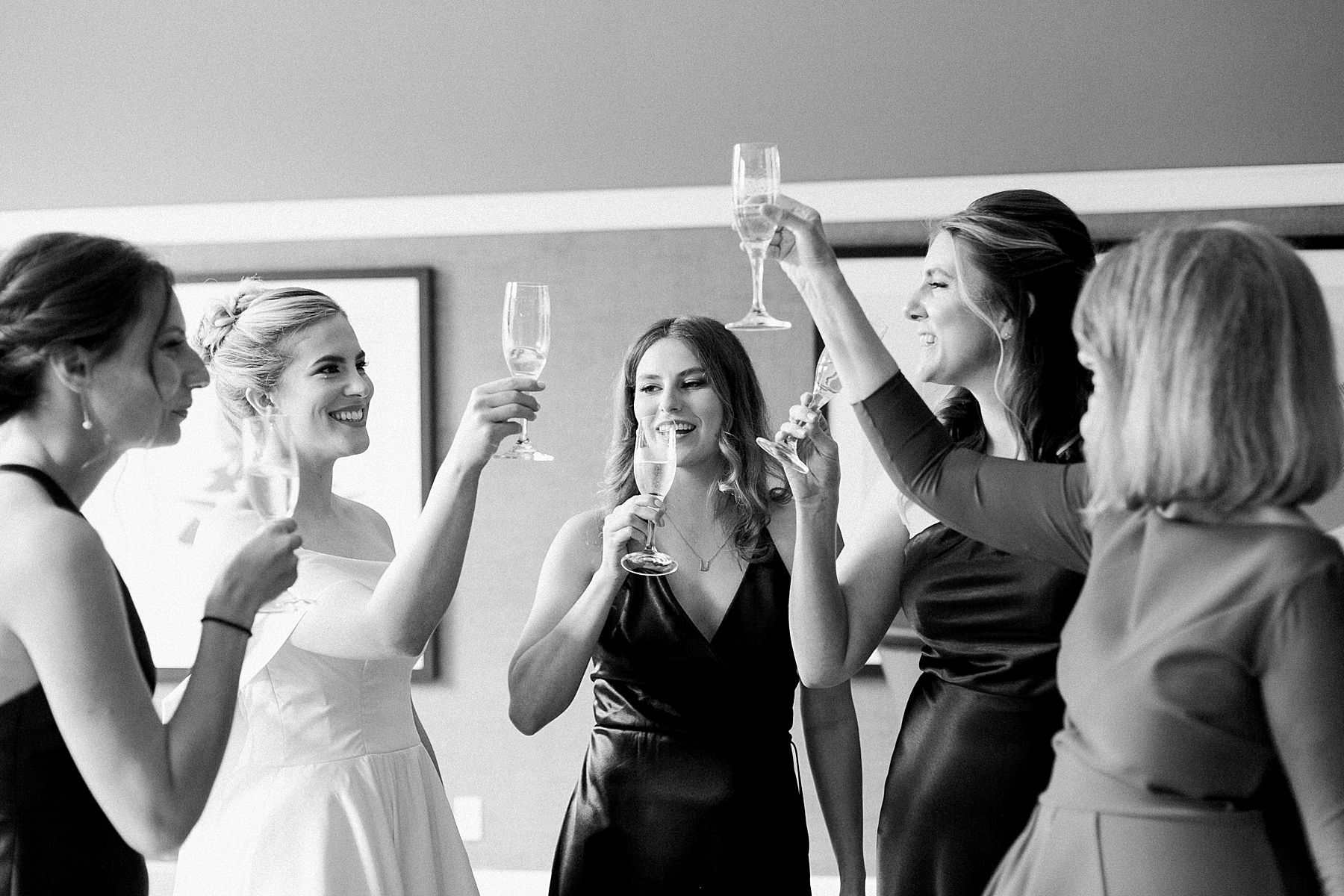 bride and bridesmaids cheers