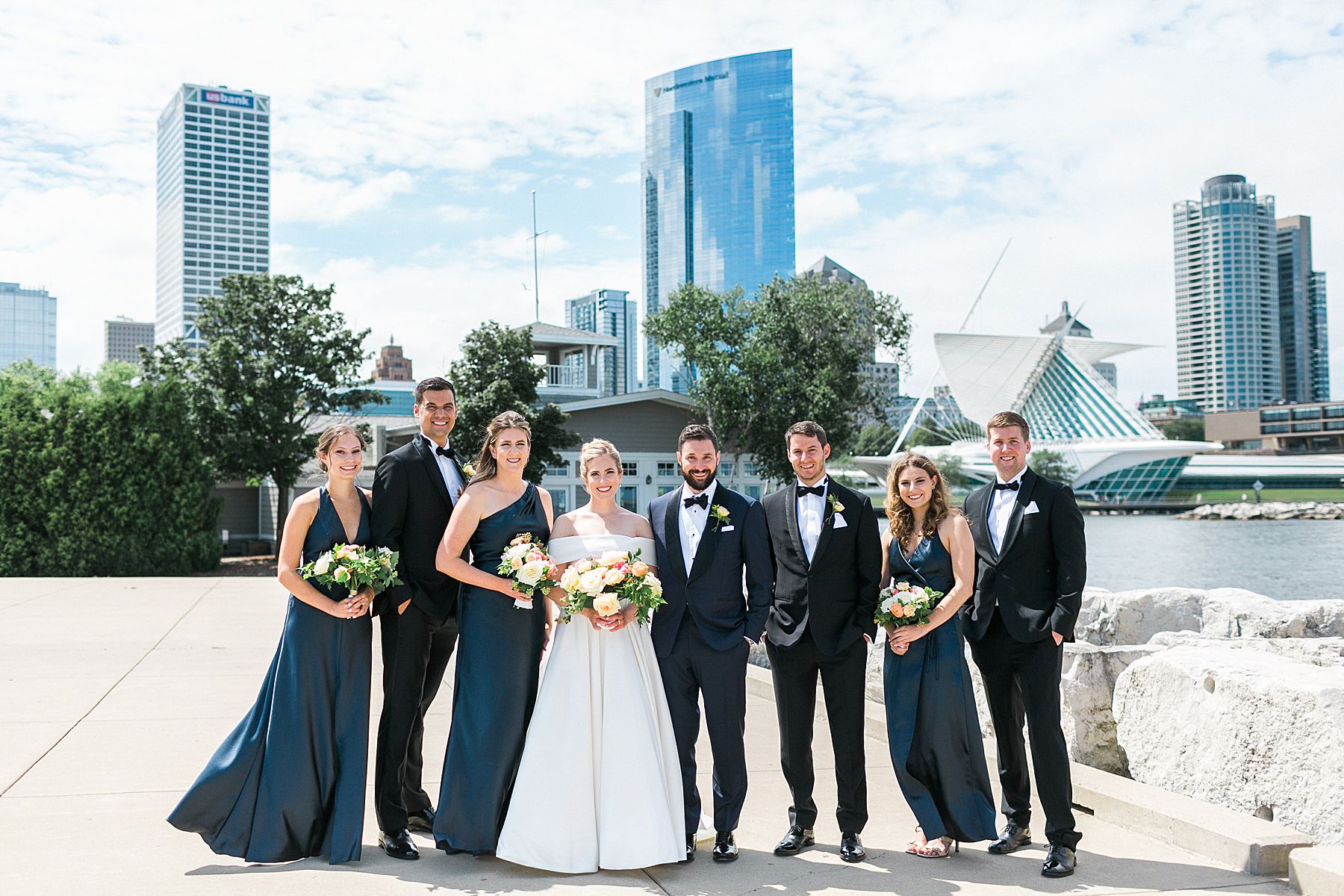 bridal party wedding portraits photos along milwaukee lakefront with the best photo ideas and locations for a wedding day