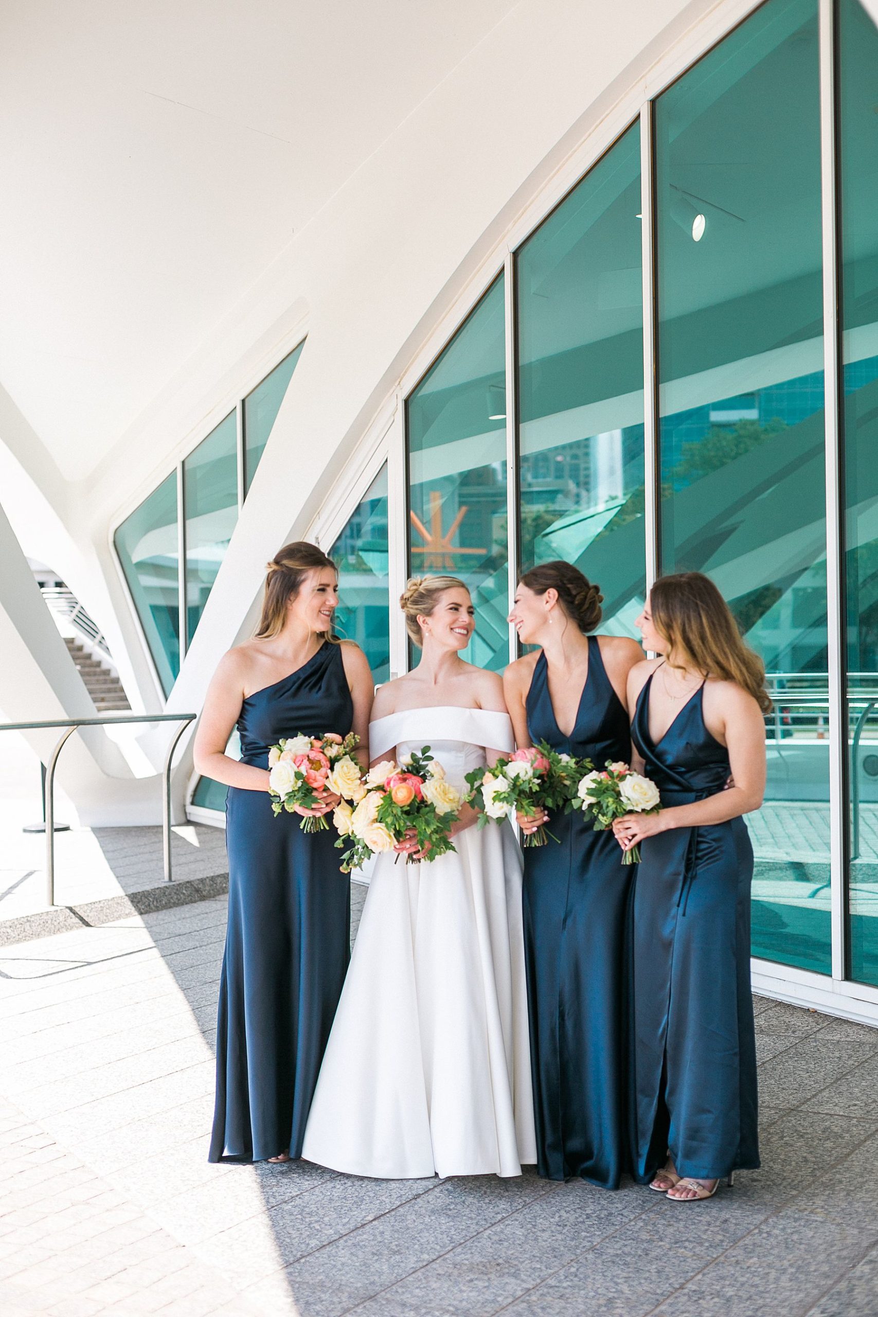 wedding bridal party portraits photos along milwaukee lakefront with the best photo ideas and locations for a wedding day