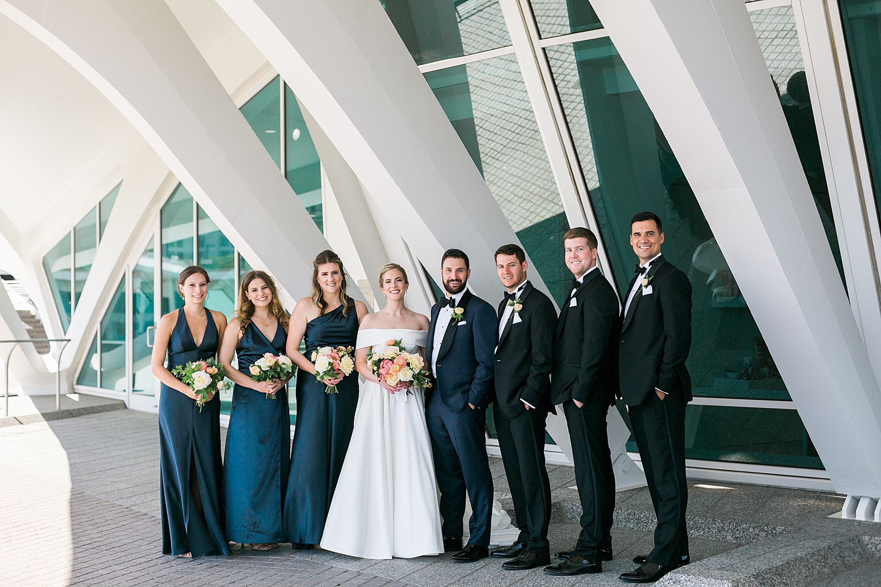 wedding bridal party portraits photos along milwaukee lakefront with the best photo ideas and locations for a wedding day