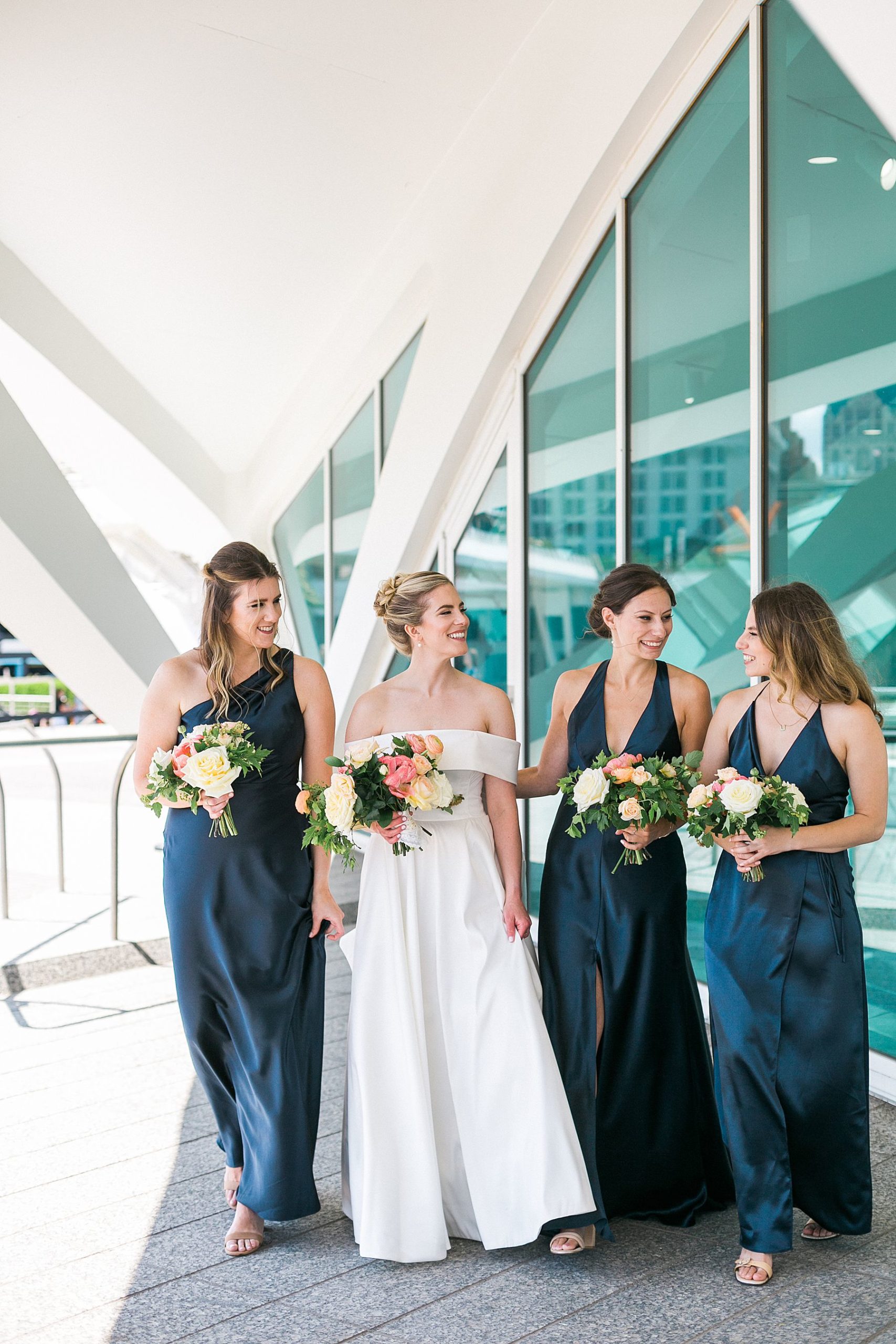bridal party portraits photos along milwaukee lakefront with the best photo ideas and locations for a wedding day