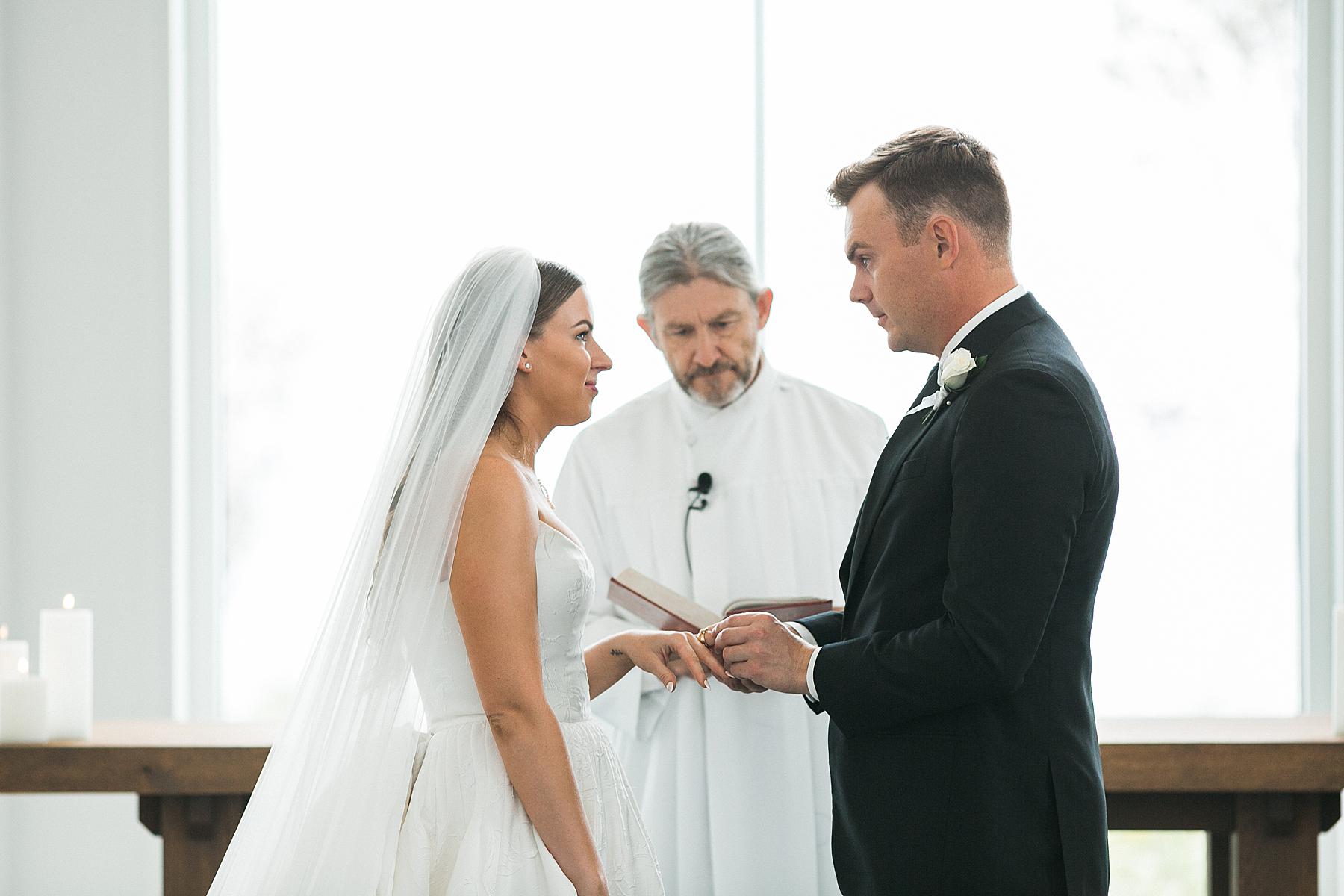 ring exchange wedding ceremony at straits chapel in kohler wisconsin