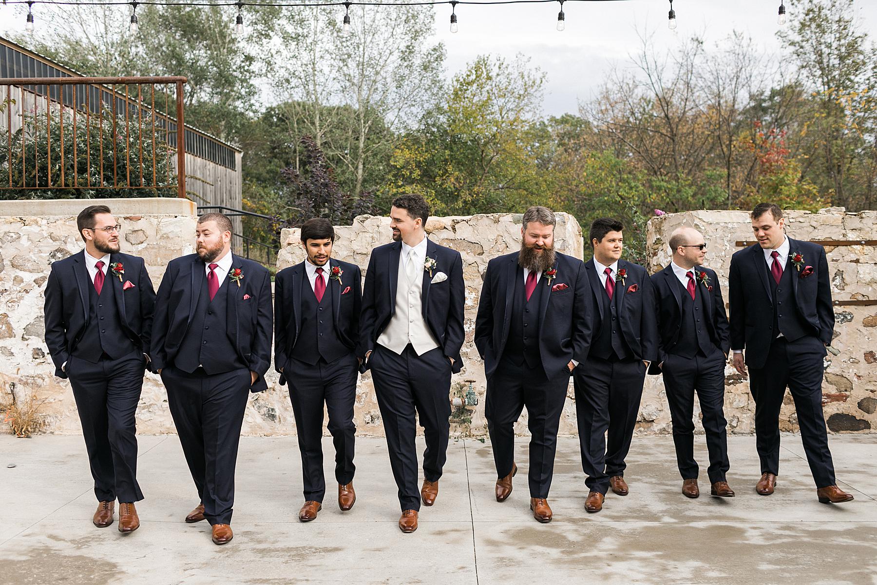 wedding party group in navy blue and maroon red fall wedding colors for rustic refined barn wedding at lilac acres in milwaukee, wisconsin