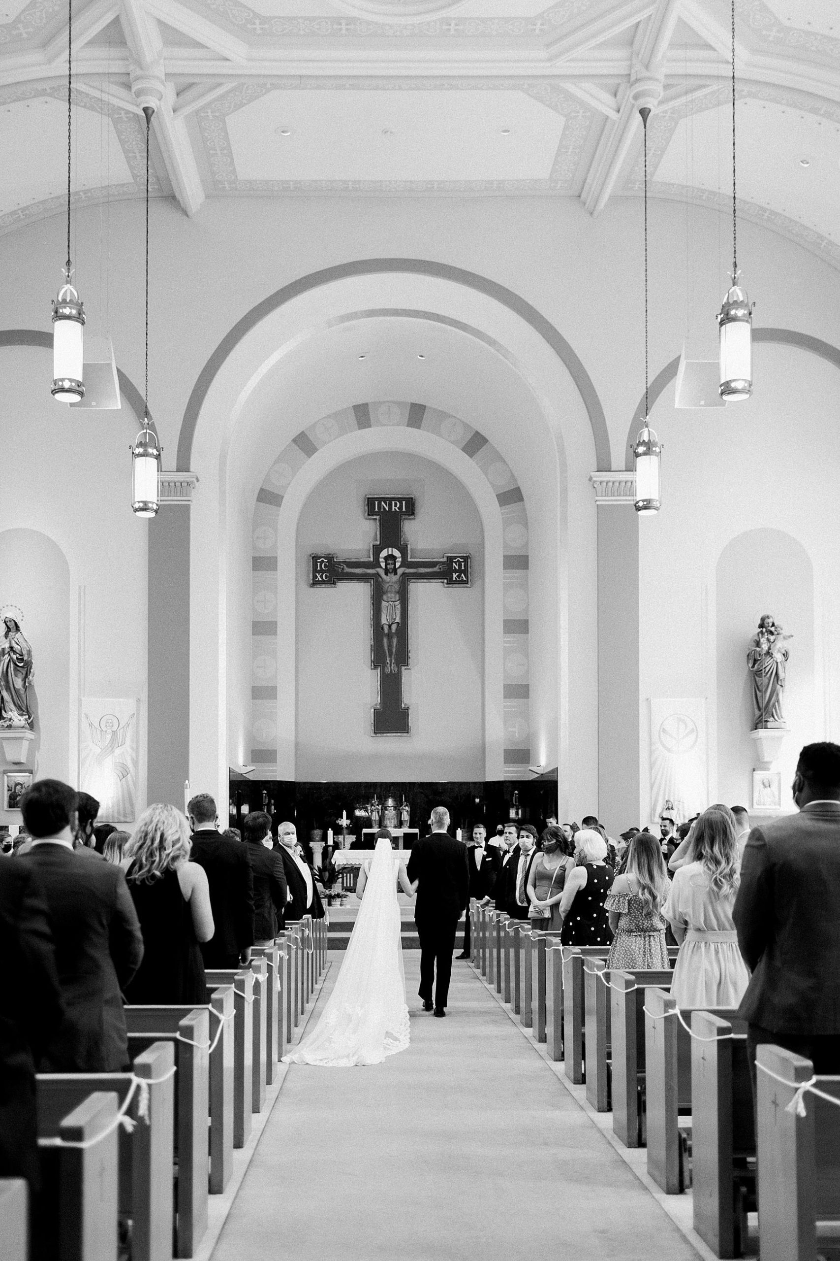 wedding ceremony in downtown church in milwaukee, wi