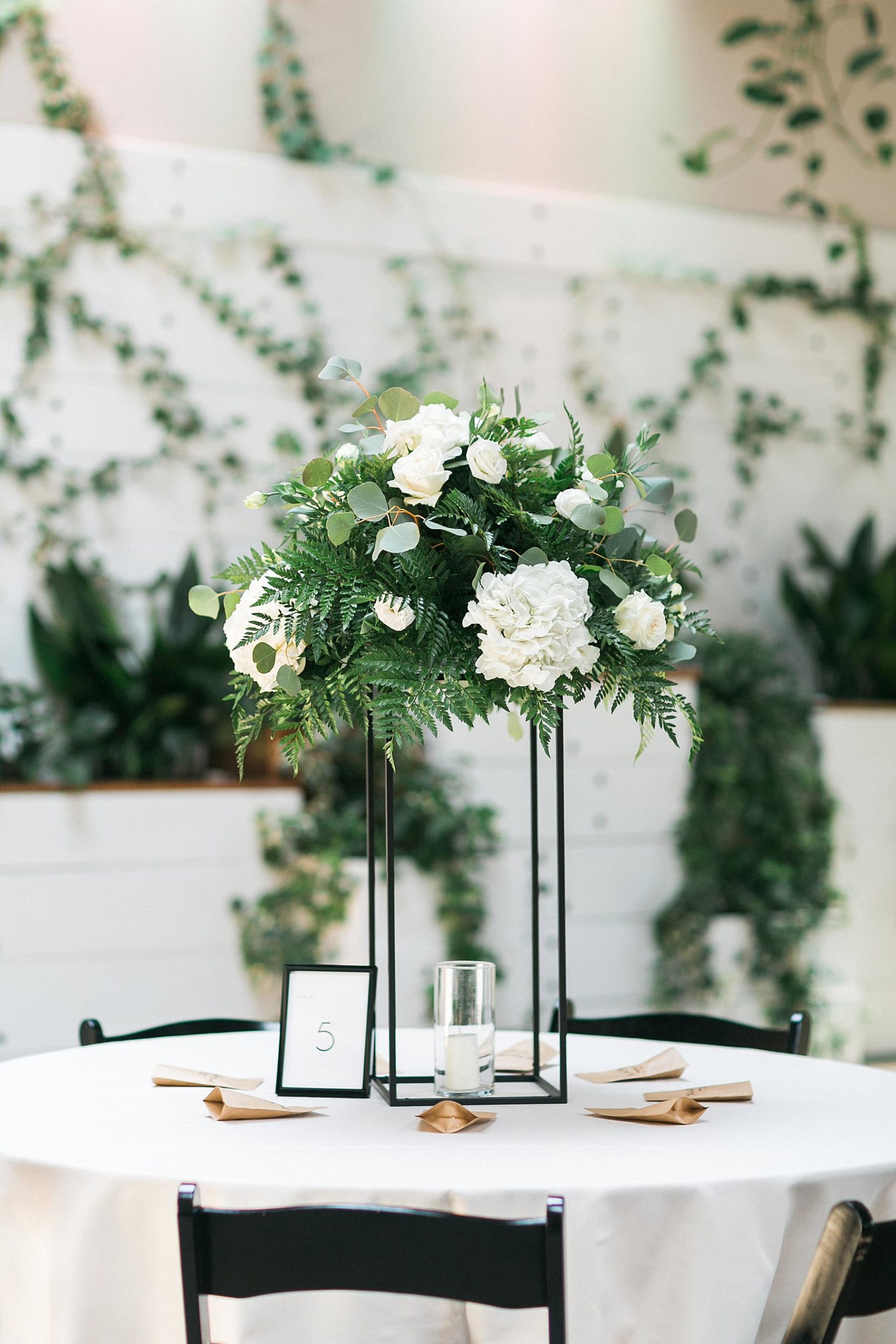 classic black and white reception decor table decorations at ivy house in downtown milwaukee, wi