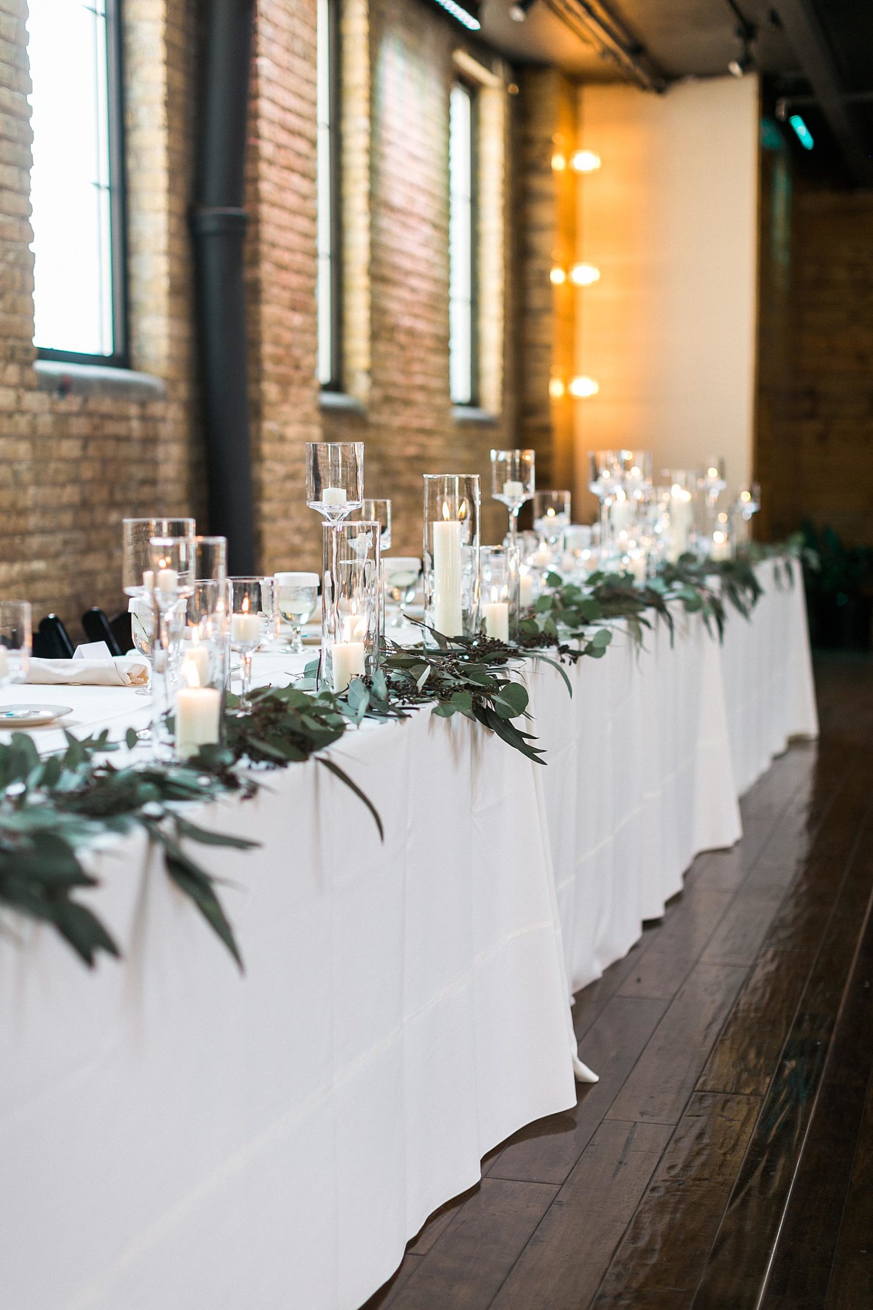 classic black and white reception decor table decorations at ivy house in downtown milwaukee, wi