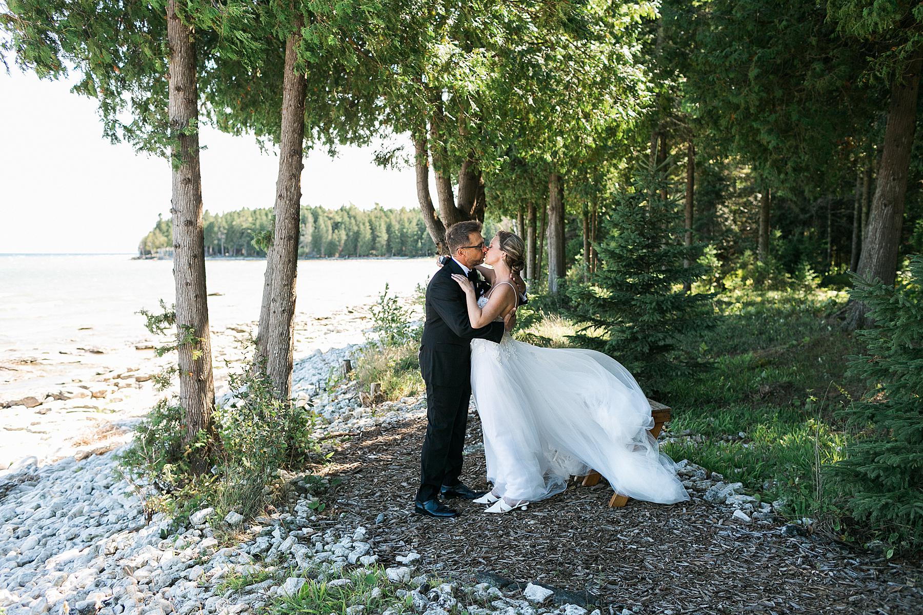 couples first look on wedding day at gordon lodge in baileys harbor door county