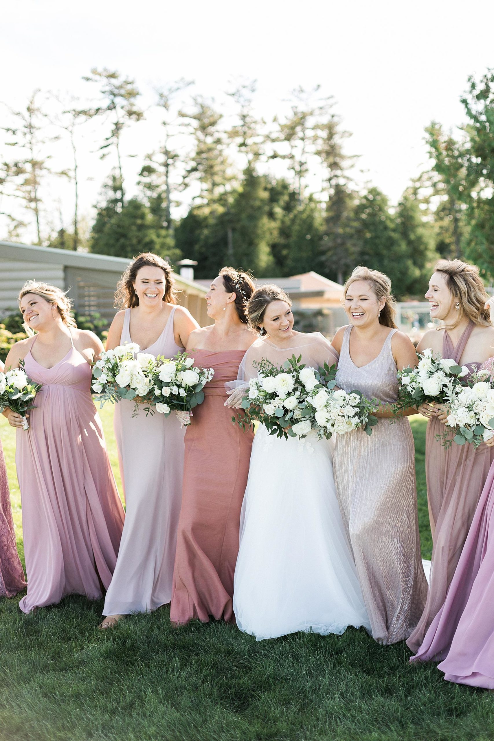 bridal party group photo on wedding day at gordon lodge in baileys harbor door county