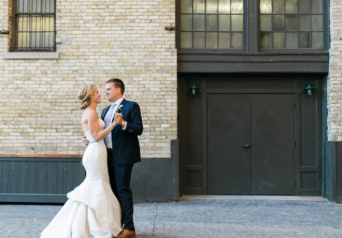 bride and groom portrait, pritzlaff building, third ward milwaukee wisconsin, organic outdoor elegant city chic wedding day, greenery, gold and blush, photo by laurelyn savannah photography