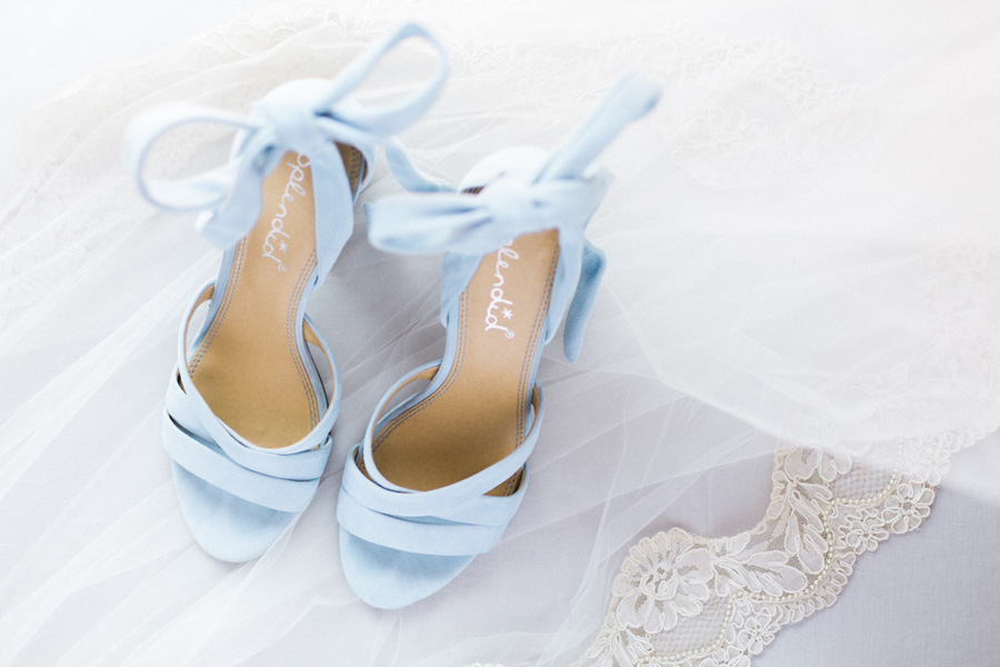 bride's shoes, outdoor tented private estate wedding in a field in wisconsin, gold and blue colors, photo by laurelyn savannah photography 1