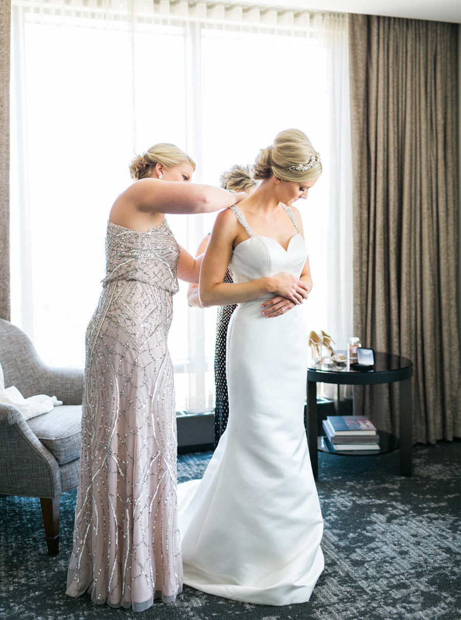 bride getting ready, classic and romantic gold wedding in downtown Green Bay, Wisconsin, photo by Laurelyn Savannah Photography