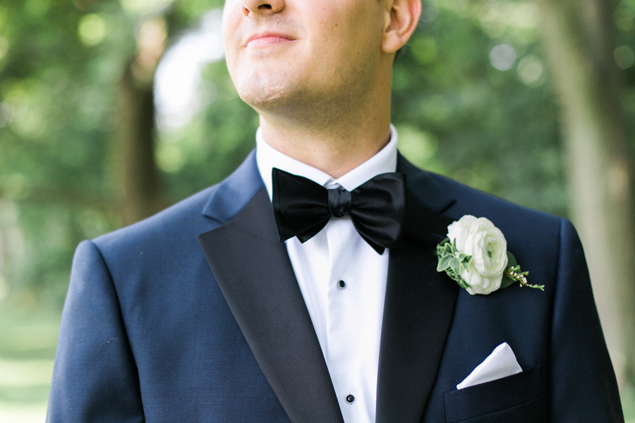 groom getting ready, elegant and modern lakefront wedding in downtown Milwaukee, Wisconsin with NYC flair, photo by Laurelyn Savannah Photography