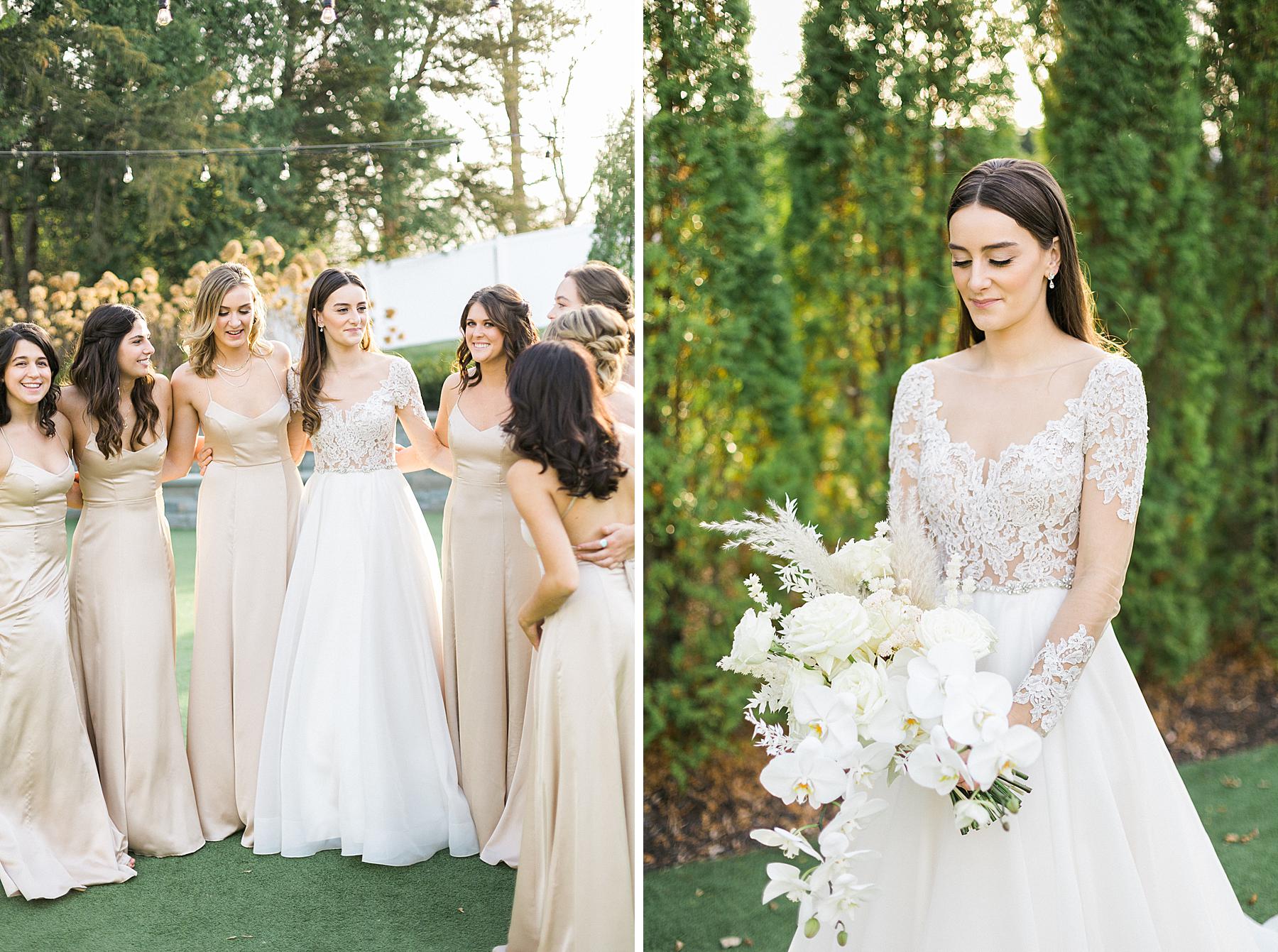 bride in white lace long sleeve gown walking with bridesmaids in nude champagne off-white dresses and white bouquets