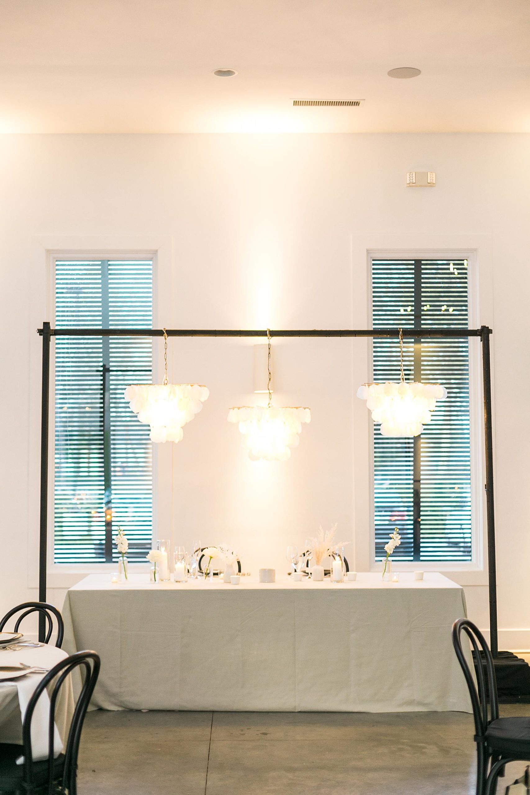 black and white elegant boho reception table decor at hutton house wedding venue in minneapolis minnesota