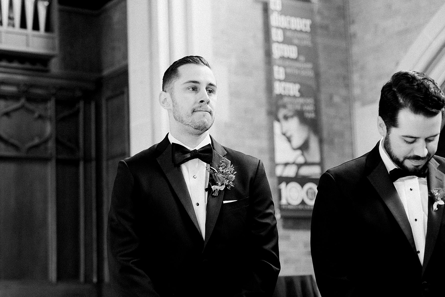 groom reaction, wedding ceremony at a church in milwaukee, wisconsin