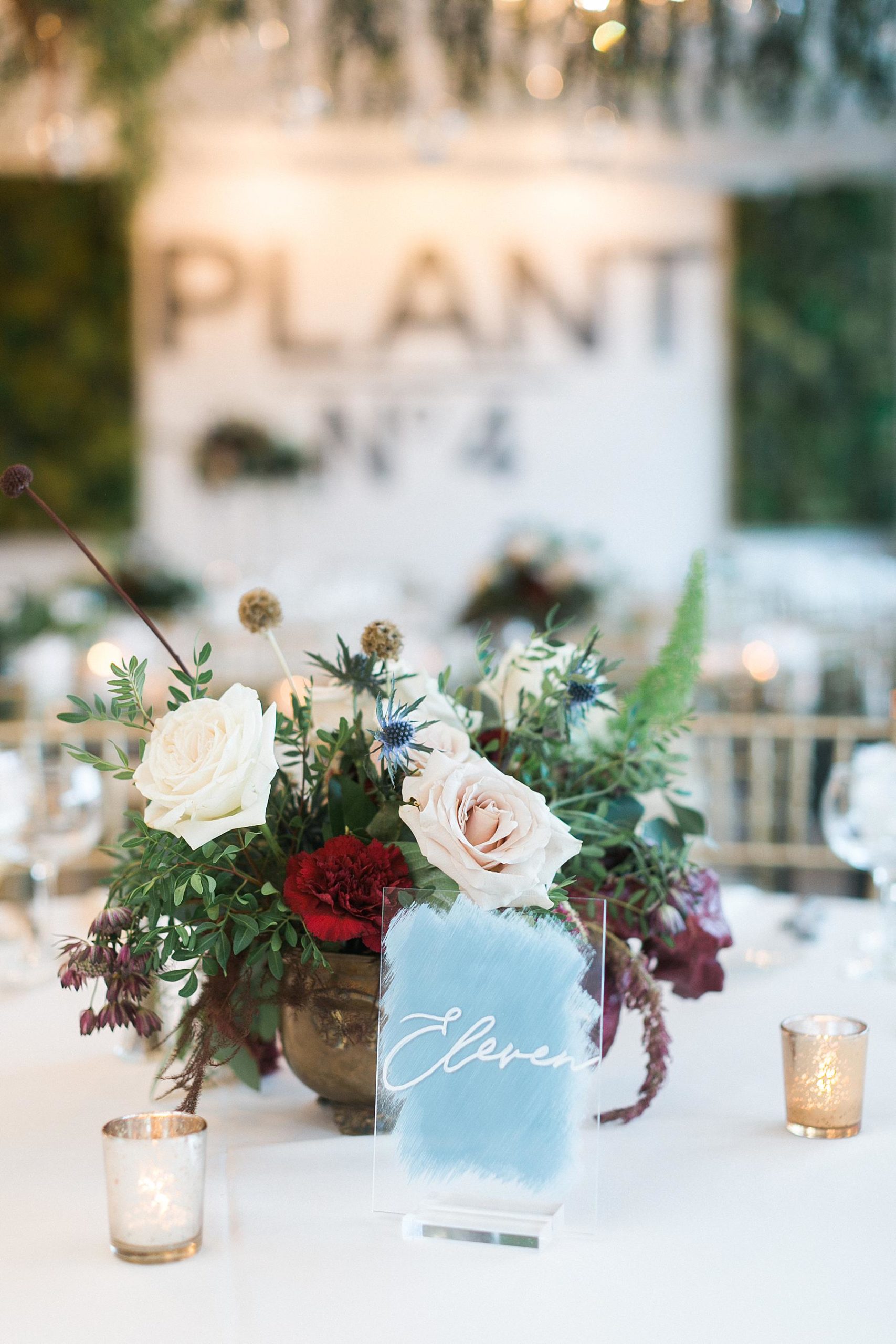 jewel-toned red and blue wedding reception decor at plant no 4 in milwaukee, wisconsin
