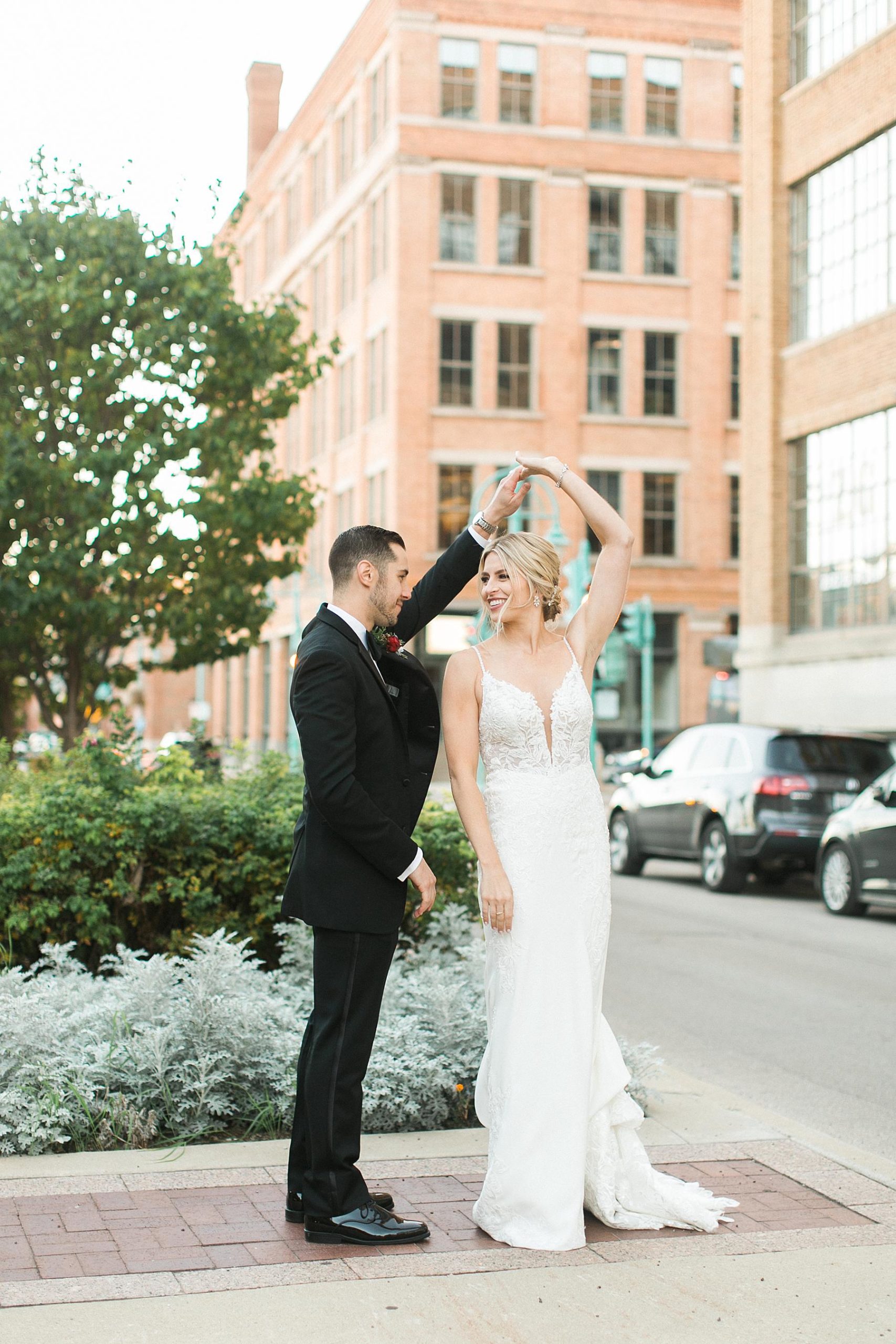 newlywed couple portraits outdoors downtown in milwaukee, wisconsin