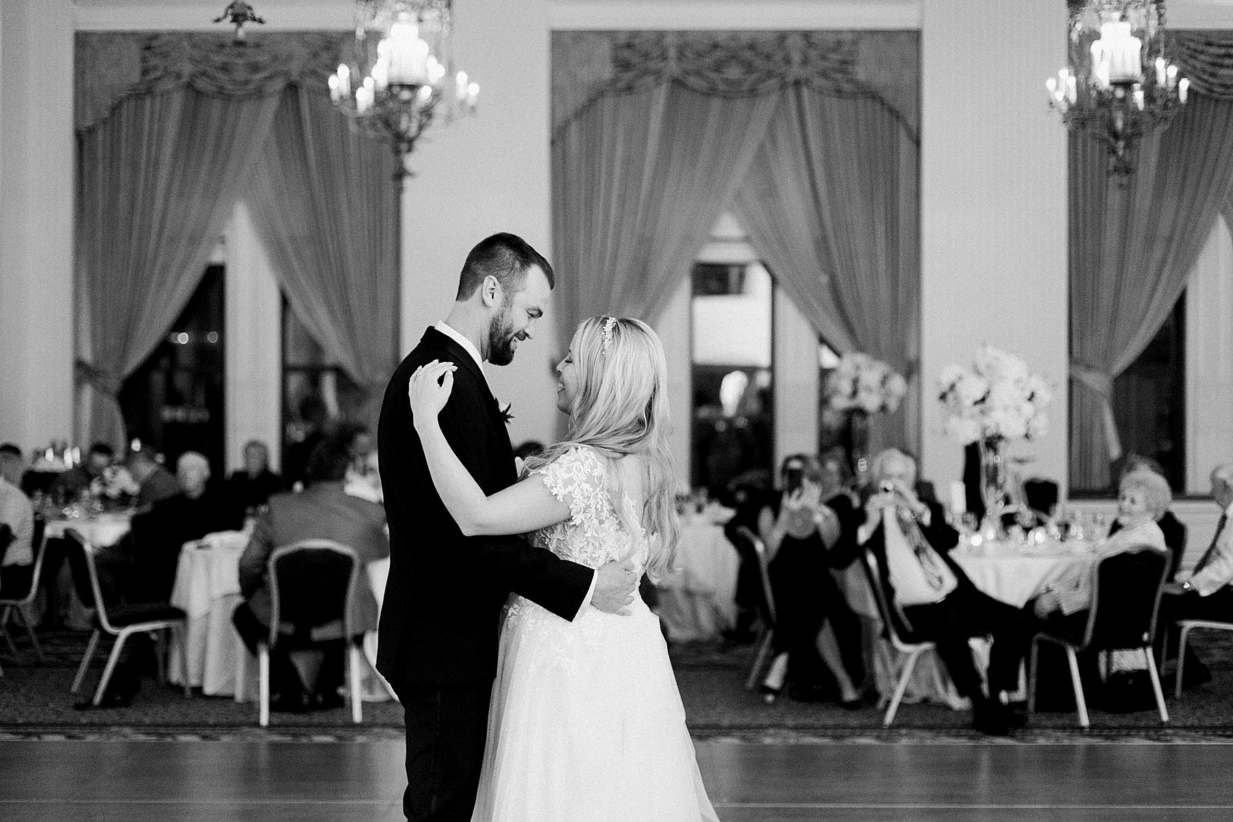first dance at classic pfister hotel white and gold elegant milwaukee wedding reception