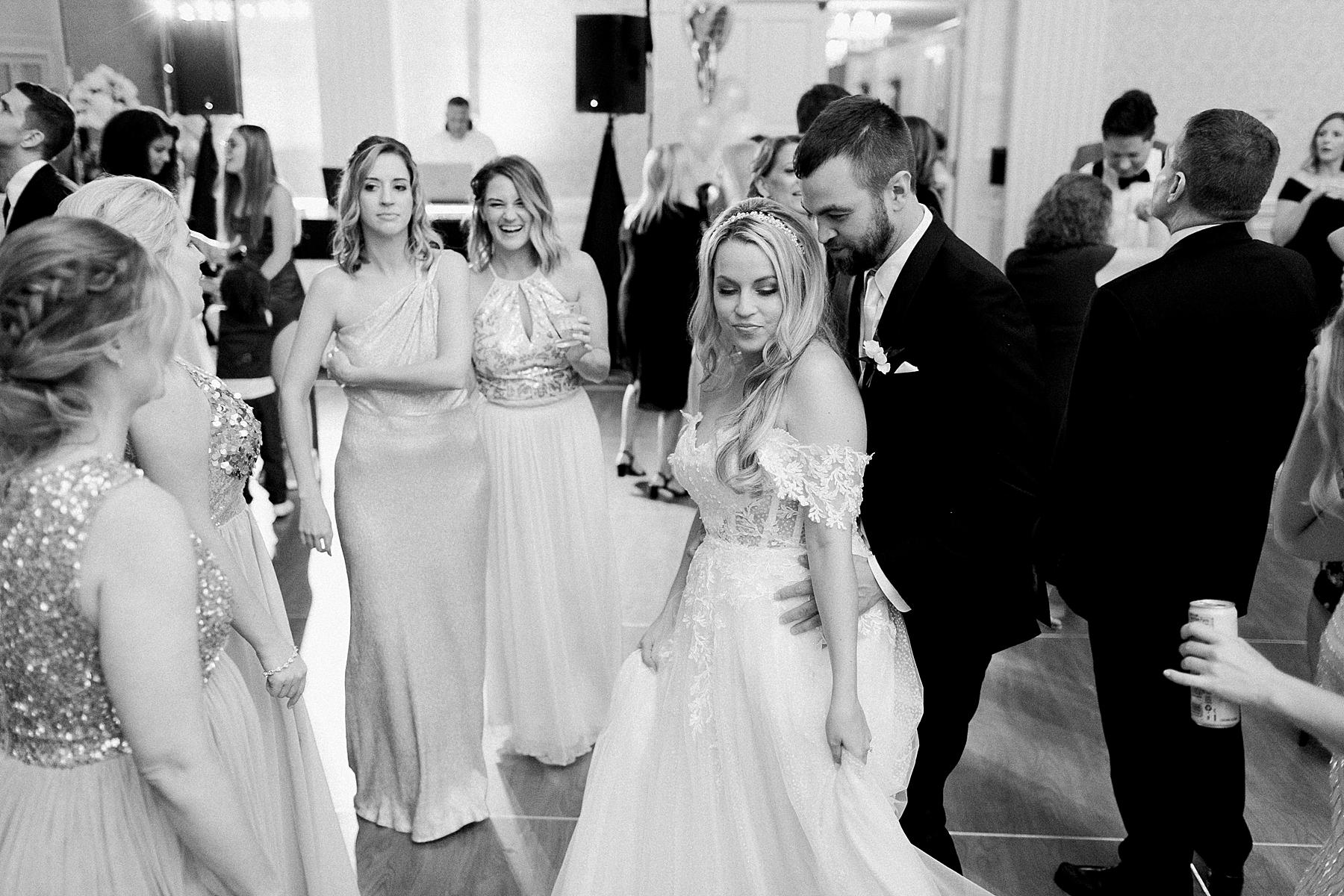 dancing at classic pfister hotel white and gold elegant milwaukee wedding reception